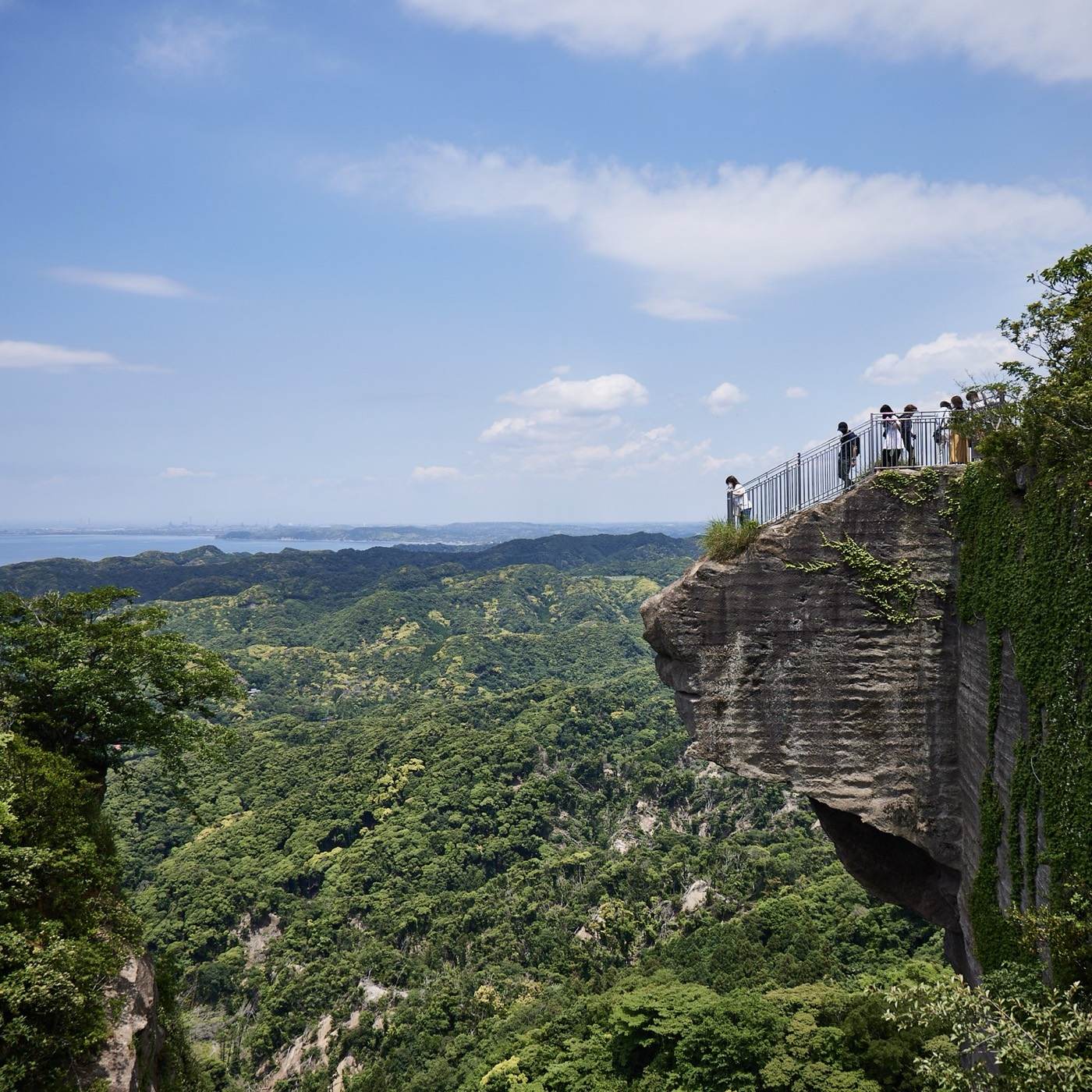 Jigoku Nozoki, the Hell Peek ledge of Mt. Nokogiri, with visitors looking out over Tokyo Bay